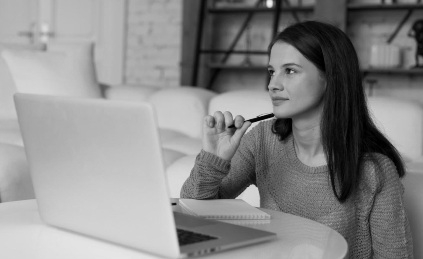 Senior risk management consultant reviewing financial data and market analysis